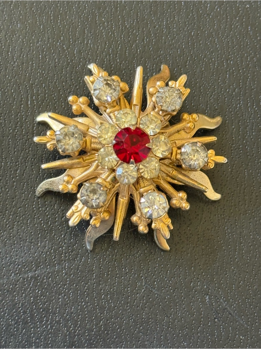 Gold-Tone Sunburst vintage Brooch with Red Center Gem